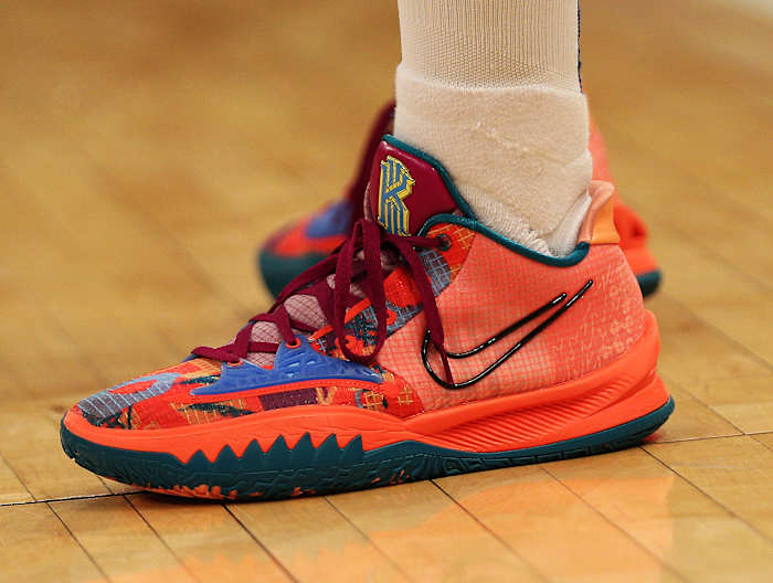 New York Knicks guard Evan Fournier wears the Nike Kyrie Low 4 '1 World 1 People' sneakers against the Chicago Bulls on March 28, 2022.